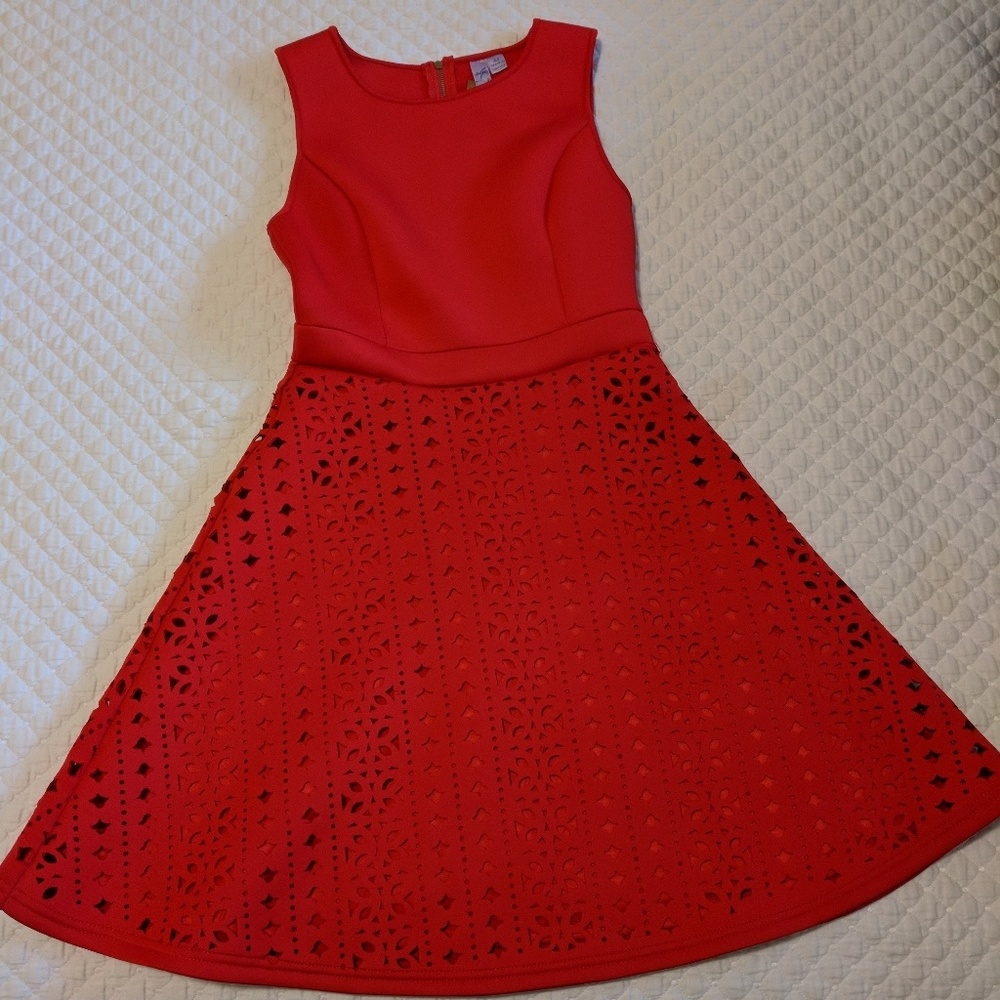 Red dress with laser cut details from Franchesca's